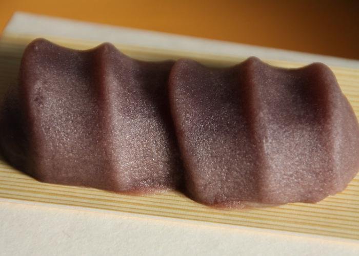 Red bean Japanese sweet pressed with ridges on bamboo dish