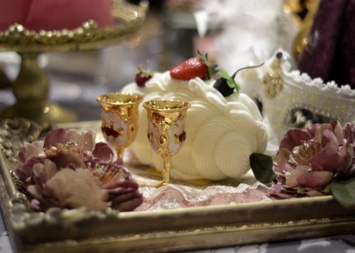 A platter with goblets, sweets, and lace, arranged at the Hilton Tokyo for the Marie Antoinette desserts buffet