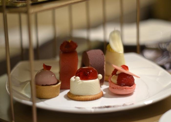 Tokyo Dessert Buffet Spread: Rose Cream Macaron, Strawberry Rare Cheesecake, and Raspberry and Ruby Chocolate Tart