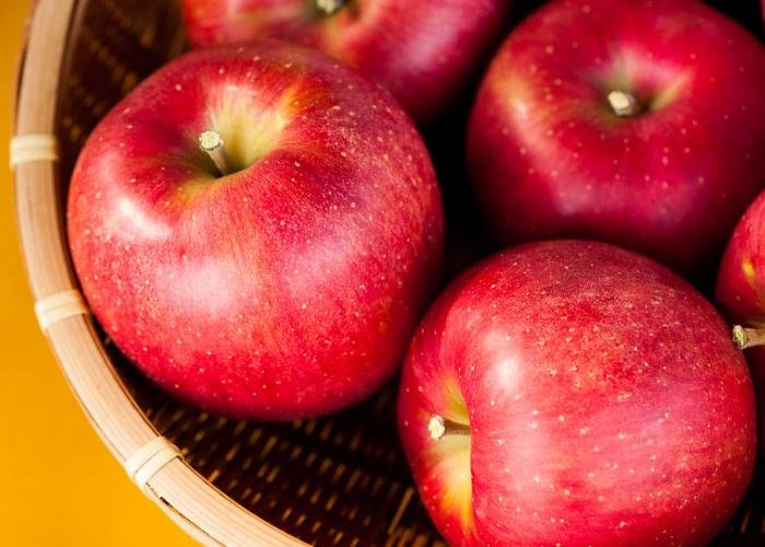 A basket of red Aomori apples
