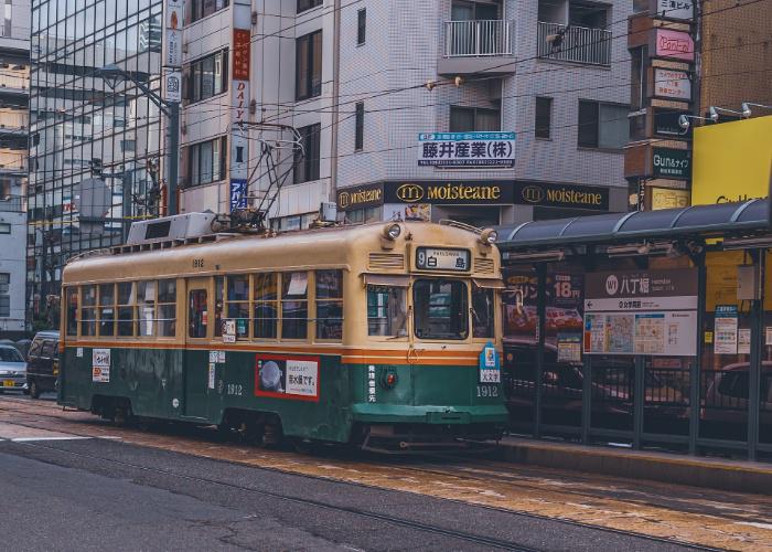 A Hiroshima city tram stopping in front of Hatchobori