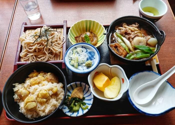 Set meal with rice, stew, soba, pickles, dessert