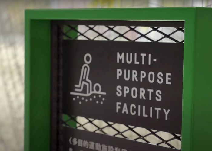 A sign saying "Multipurpose Sports" at a Tokyo Rooftop Park in Shibuya, Miyashita Park