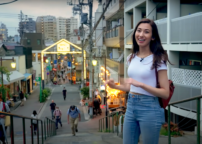 Shizuka Anderson standing on Yanaka Ginza's Yuuyake Dandan (Sunset Steps)