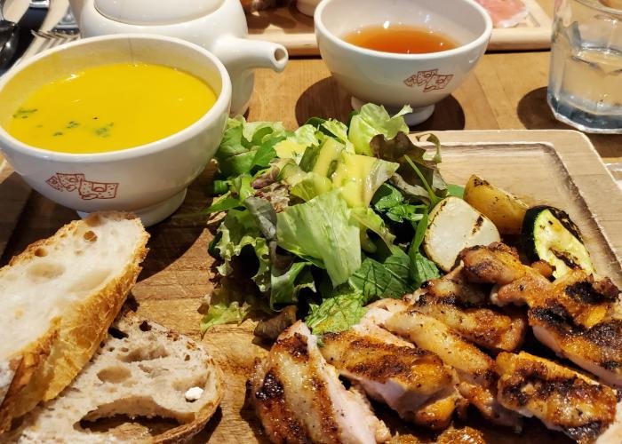 Plate filled with bread, salad, and veg from Le Pain Quotidien