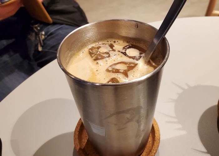 Iced coffee in a stainless steel tumbler from Kopikalyan