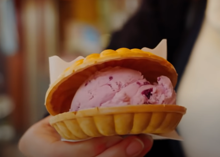 Purple sweet potato ice cream sandwiched between two rice wafers