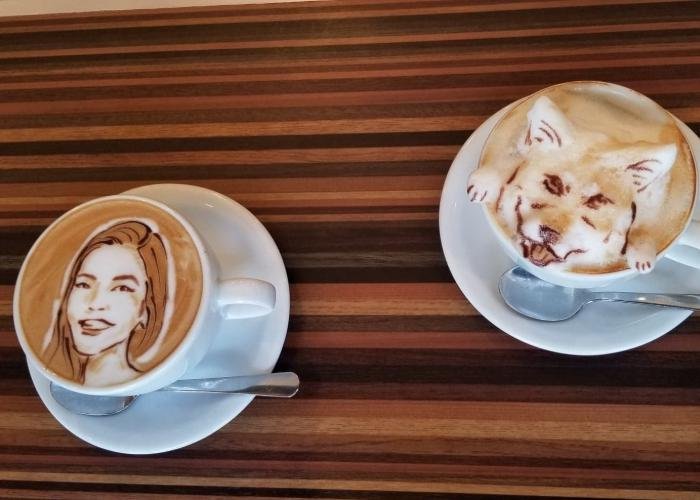 2D latte caricature of Shizuka Anderson and 3D latte art of a dog at Reissue