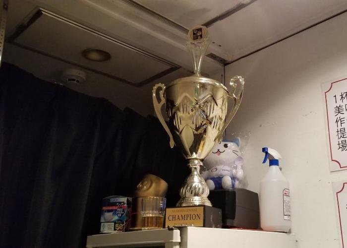 Ramen Championship Trophy on a shelf at Fujiya Premium