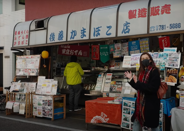 Shizuka Anderson stands in front of Goto Kamabokoten in Togoshi Ginza