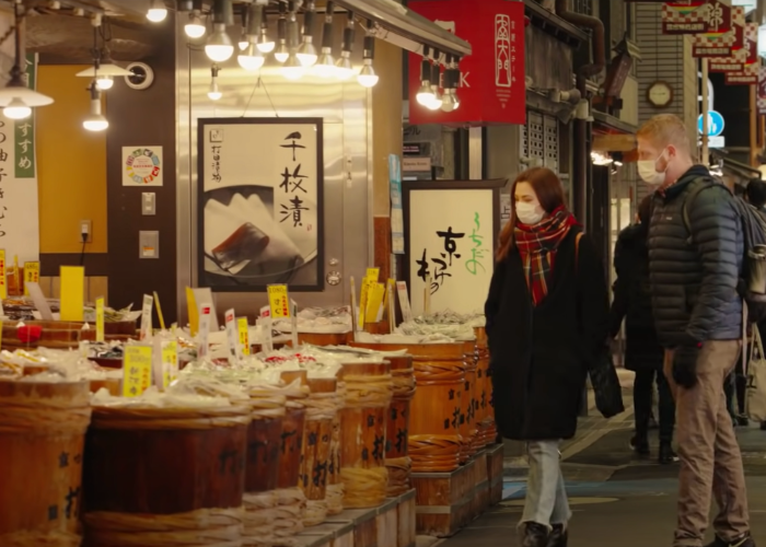 Shizuka Anderson and Kevin stroll through Nishiki Market, passing by a tsukemono shop