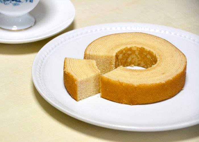 Baumkuchen from Shiga Prefecture on a plate, layer cake with a hole in the center