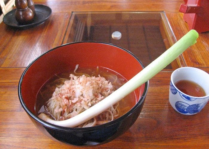 Negi Soba, a bowl of soba noodles with a long green onion as an eating utensil, a specialty from Fukushima prefecture