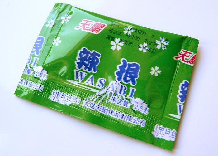 Packet of fake imitation wasabi paste on a white background