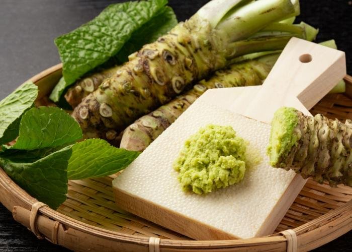Real wasabi plant grated on a sharkskin grater