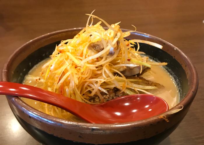 Bowl of Shinshu Miso Ramen using Nagano miso, with a heaping mound of veggies on top