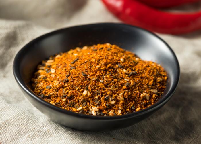 Shichimi togarashi, Japanese seven spice in a small black bowl