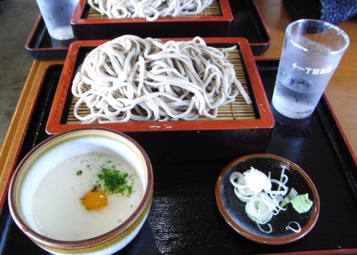 Tororo Soba on a tray, with the noodles and bowl of toppings plated separately