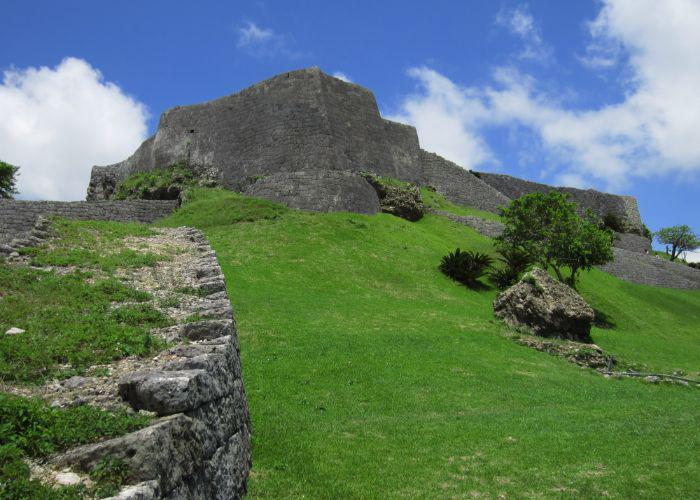 Stone ramparts and walls on a grassy hill