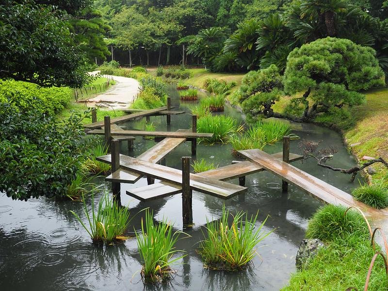 Yatsuhashi Bridge over a pond at the Korakuen Garden in Okayama
