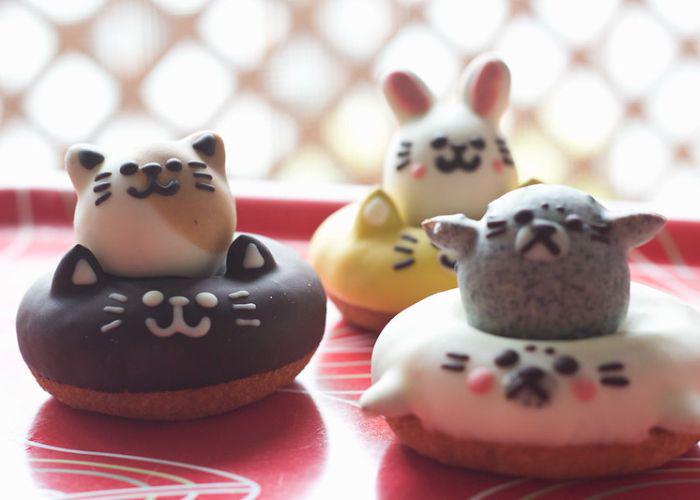 Ring donuts shaped into forms and designs resembling animals