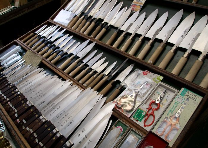 Image showing three rows of Japanese knives for sale in a shop