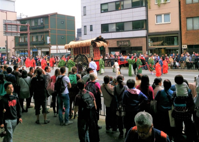 Float in Kyoto Jidai Matsuri and people watching 