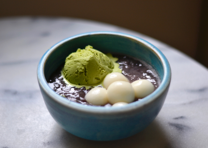 Bowl of hiyashi shiratama zenzai with a scoop of matcha ice cream
