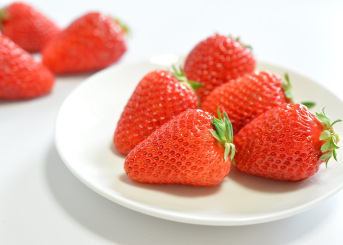 Strawberries on a plate.
