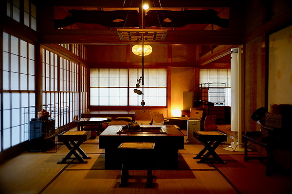 Cozy traditional Japanese restaurant interior with warm lighting