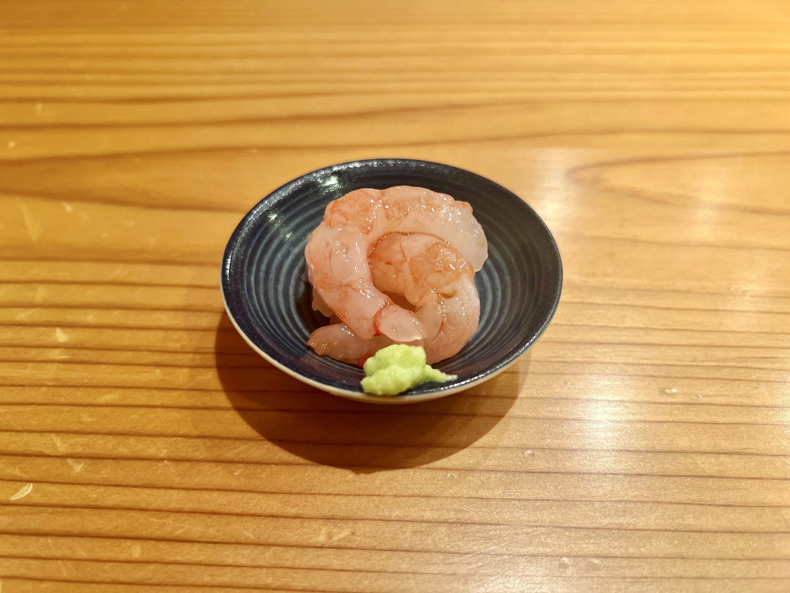 Freshly prepared shrimp at Hatsune Sushi (Niigata), served with a side of wasabi.