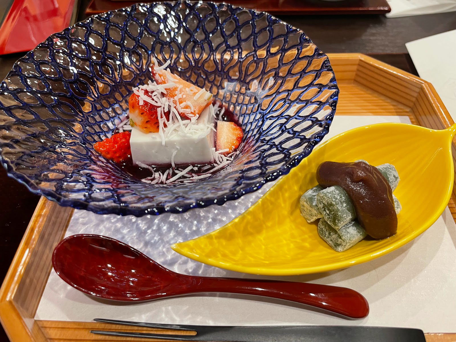 Two dessert dishes at Common, each served in uniquely shaped dishes.