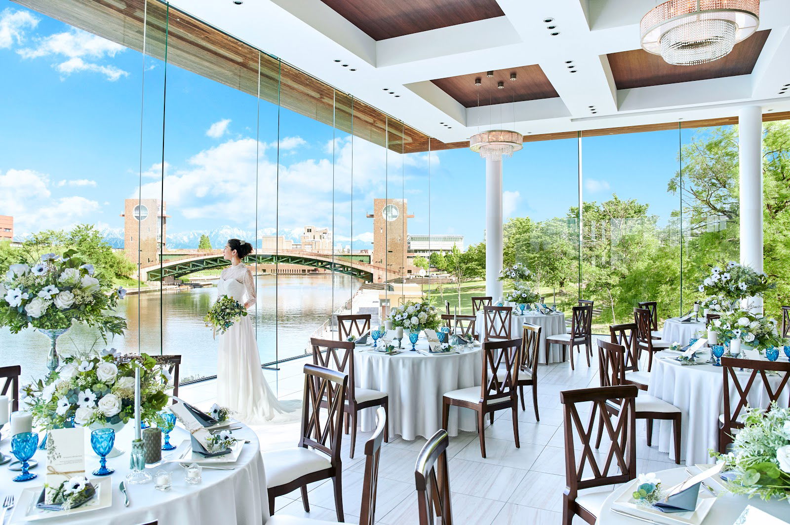 La Chance decorated for a wedding, adorned in white with a bride looking out of the window.