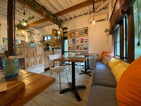Cozy café interior with wooden tables and vibrant decor