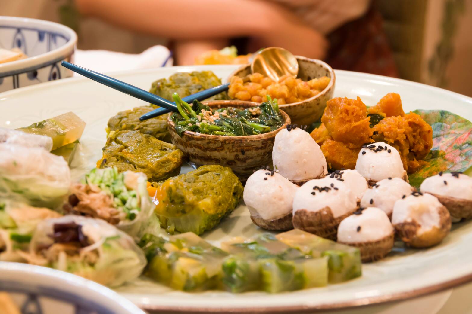 Assorted Vietnamese dishes elegantly plated at a high-end restaurant
