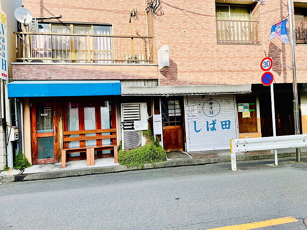 Charming Japanese restaurant exterior with rustic wooden accents