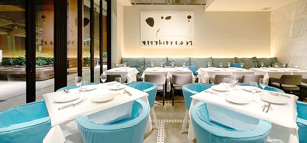 Elegant restaurant interior with modern design and blue accents