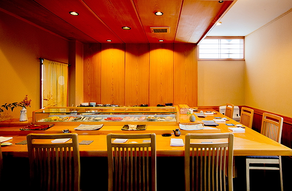 Elegant sushi bar in a Japanese restaurant with wooden decor