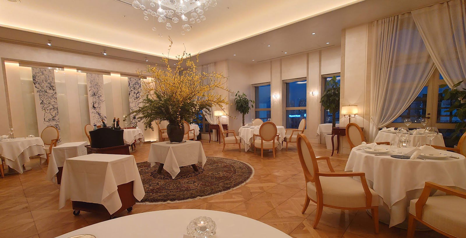Elegant fine dining restaurant with luxurious decor and soft lighting