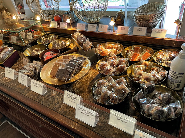Assorted gourmet treats displayed at a cozy cafe