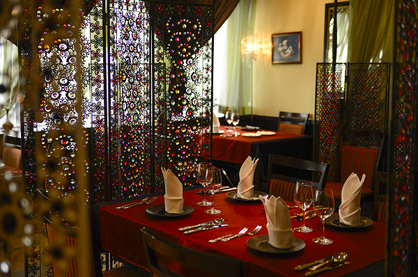 Elegant restaurant dining area with ornate decorations