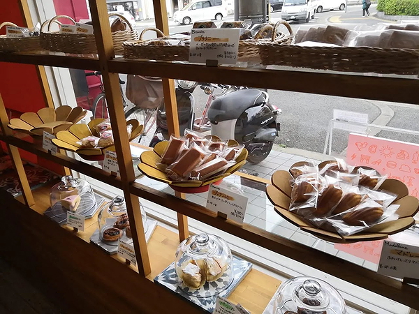 Freshly baked goods displayed in a bakery window