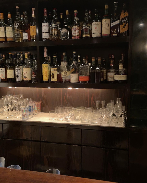 Elegant bar display with premium whiskey selection
