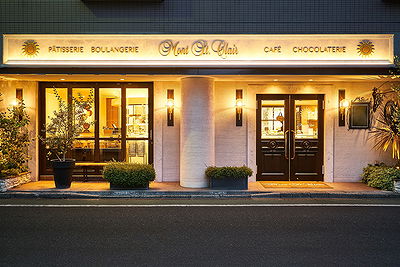 Charming café bakery storefront with elegant lighting
