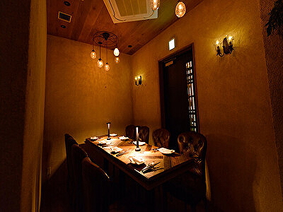 Cozy restaurant interior with dim lighting and elegant table setup