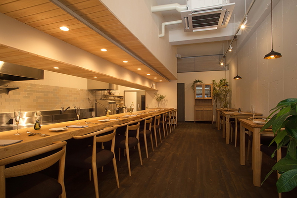 Modern restaurant interior with wooden decor and cozy lighting
