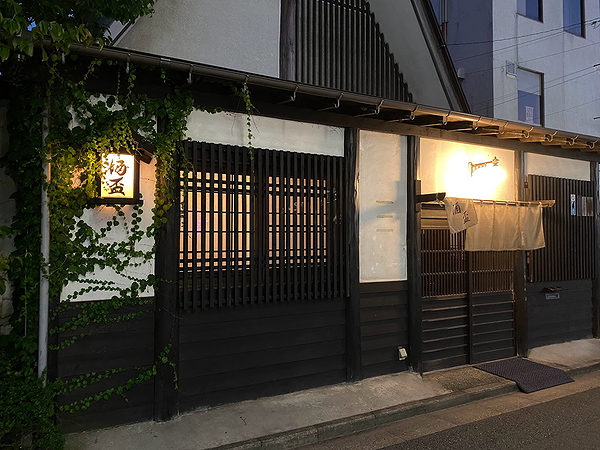 Cozy Japanese restaurant exterior with traditional wooden design