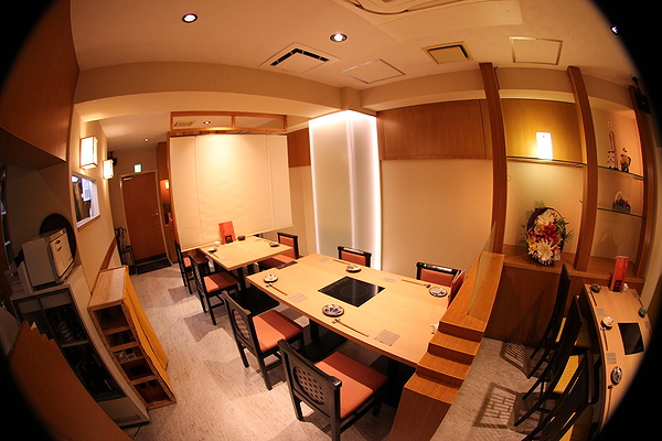Modern restaurant interior with wooden decor and ambient lighting