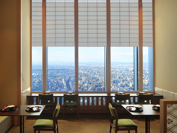 Skyline view dining room with elegant table setting