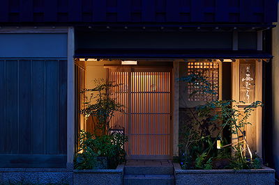 Cozy Japanese restaurant entrance with traditional wooden décor